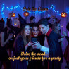 Person looking at smartphone and reacting to a premium digital Halloween party video invitation.
